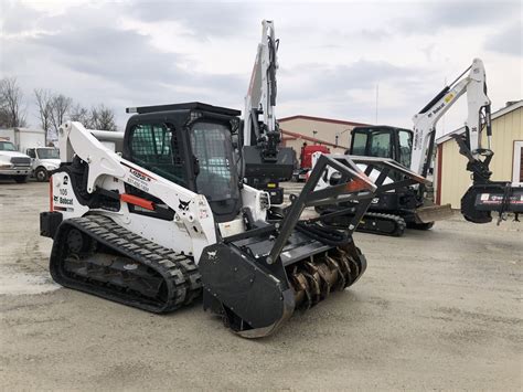 bobcat tracked skid steer with deforester attachment rental near me|skid steer trencher attachment rental.